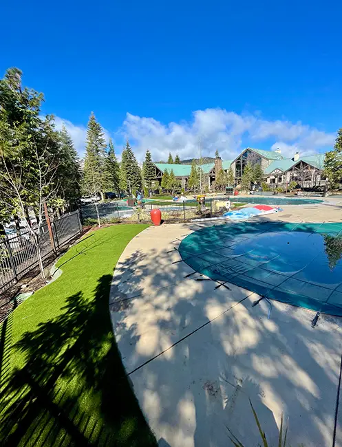 Artificial grass pool area installed by SYNLawn